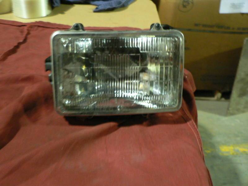 GENERAL MOTORS FRONT HEAD LIGHT 5973929 JIMMY SIERRA